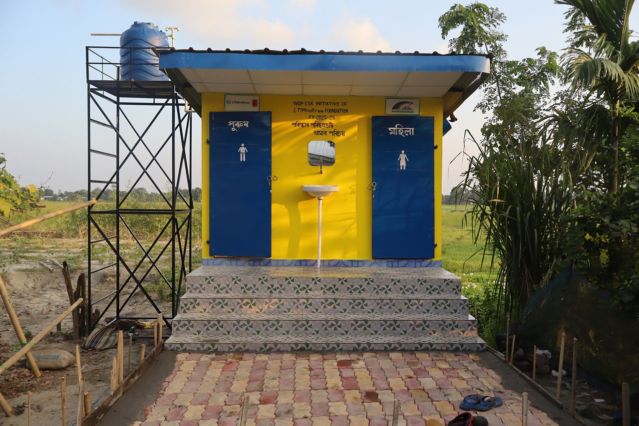 Raised toilets and hand pumps improve hygiene and living conditions in Assam